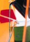 Picture of liquid pouring from one glass jug to another